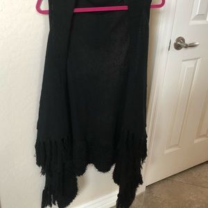 Great vest. Pretty fringe all around bottom
